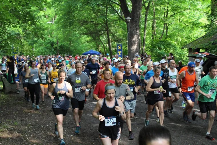 Participants in a previous Wissahickon Trail Classic, a 10k run through Wissahickon Valley Park that's been revived for 2023 after going dormant during the pandemic.