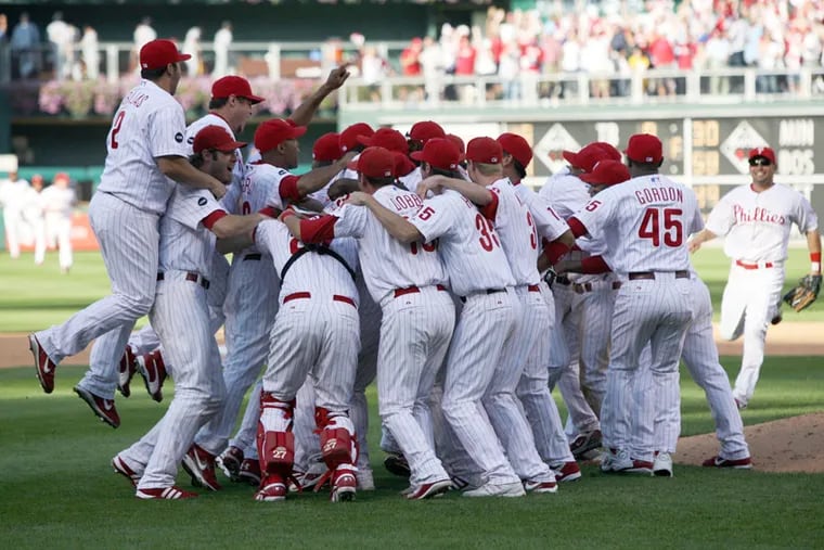 The Phillies ended a 14-year playoff drought after beating the Nationals for the NL East title at Citizens Bank Park. (Yong Kim/ Philadelphia Daily News)
