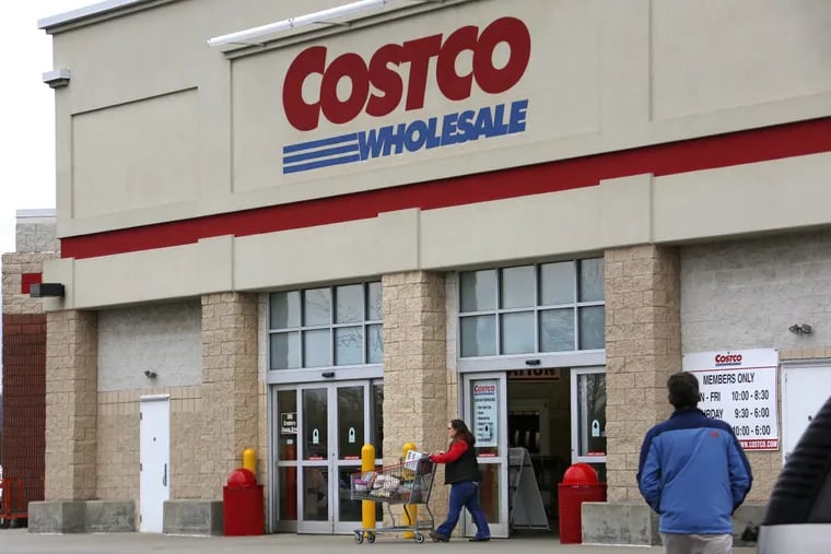 A shopper leaves a Costco store in Cranberry Township, Pa.