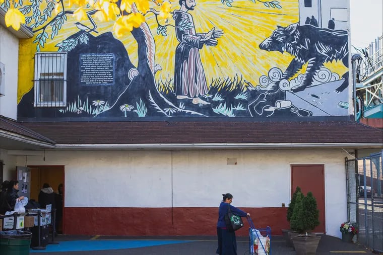 A mural in the outer yard of the St. Francis Inn soup kitchen in Kensington. "We see the toll that homelessness and poverty inflict on a person’s sense of self-worth and dignity," writes the Rev. Stephen DeWitt.