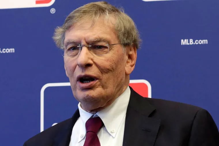 Bud Selig answers a question during a news conference at MLB headquarters, in New York, Thursday, May 16, 2013. Major League Baseball hopes to expand video review by umpires for the 2014 season and says all calls other than balls and strikes could be subject to instant replay. (Richard Drew/AP)