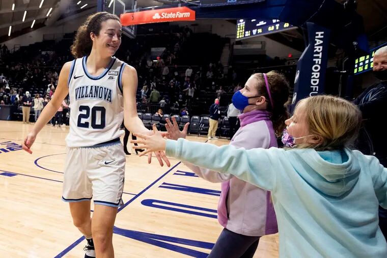 Maddy Siegrist of Villanova is congratulated by young fans after her 42-point performance against Marquette on Feb. 11 at the Finneran Pavilion.