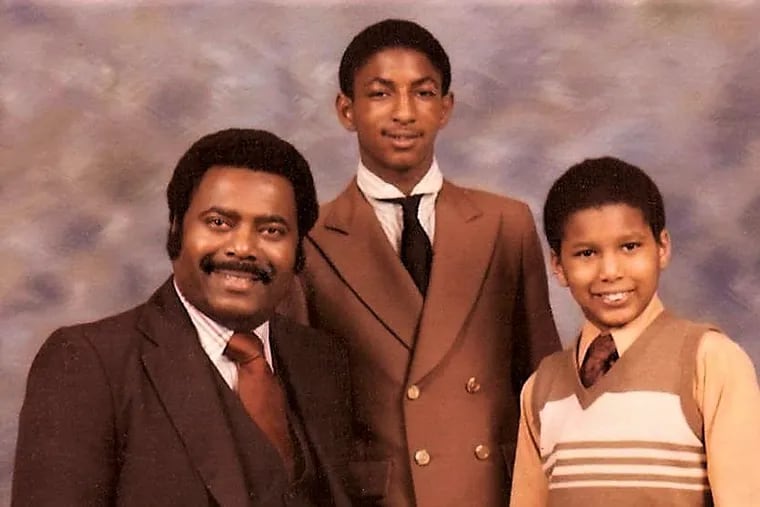 Mr. Jamison (left), with sons Ronald Jr. and Derek, loved to listen to Miles Davis music.