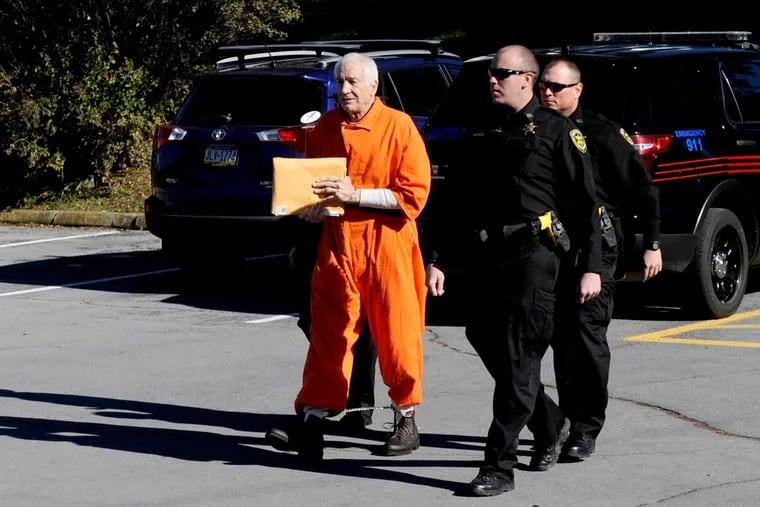 Jerry Sandusky is escorted into the Centre County Courthouse, Friday, Nov. 4, 2016, in Bellefonte, Pa.