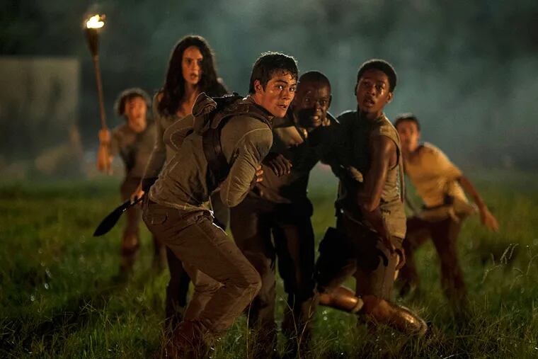 In &quot;The Maze Runner,&quot; adapted from James Dashner's postapocalyptic YA books, (from left) Kaya Scoderlario, Dylan O'Brien, Aml Ameen, and Jacob Latimore play teens trying to escape a youth facility.