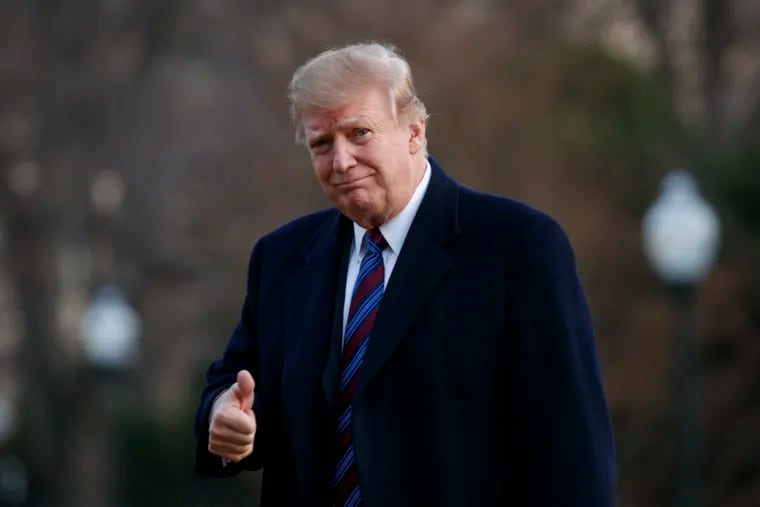 President Donald Trump gives the thumbs-up as he arrives on Marine One on the South Lawn of the White House in Washington, Friday, Feb. 8, 2019, as he returns from his annual physical exam at Walter Reed National Military Medical Center. (AP Photo/Carolyn Kaster)
