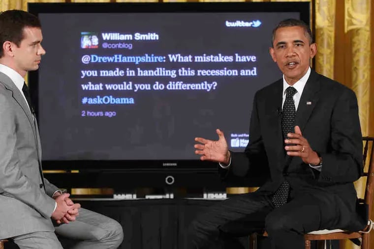 President Obama, joined by Twitter cofounder Jack Dorsey, answers questions at the town hall at the White House.