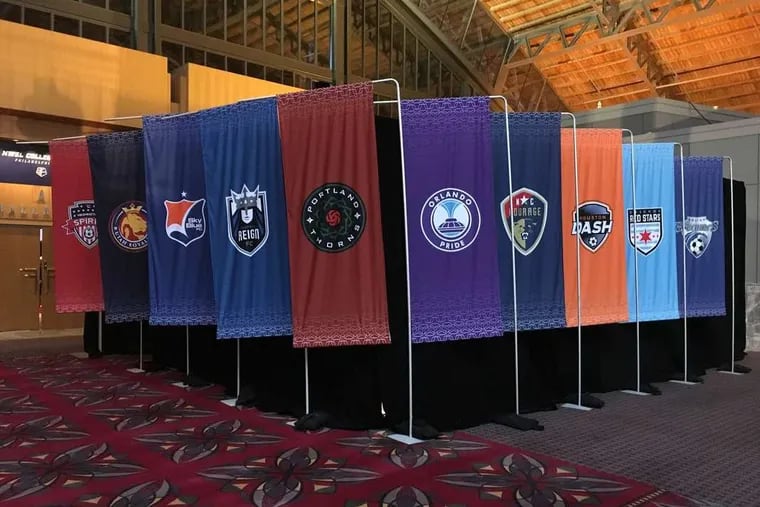 Banners representing the National Women’s Soccer League’s 10 teams outside the draft hall at the Pennsylvania Convention Center.