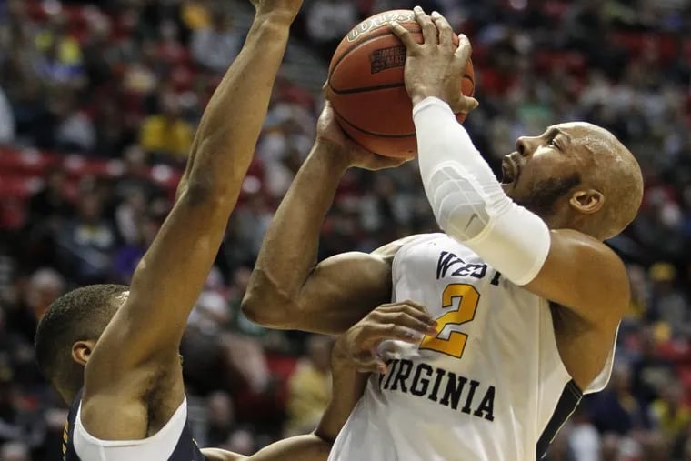 West Virginia is led by senior guard Jevon Carter (right).