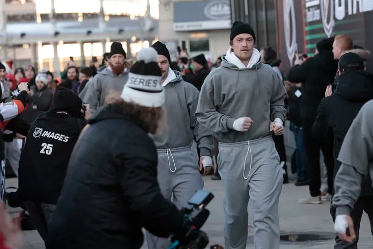 Travis Sanheim and the Flyers arrive dressed as Rocky for their Stadium Series outdoor game on Saturday night.