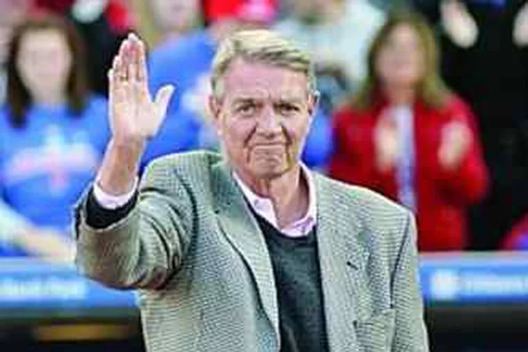 Harry Kalas waves to fans during the World Series victory celebration at Citizens Bank Park in October.