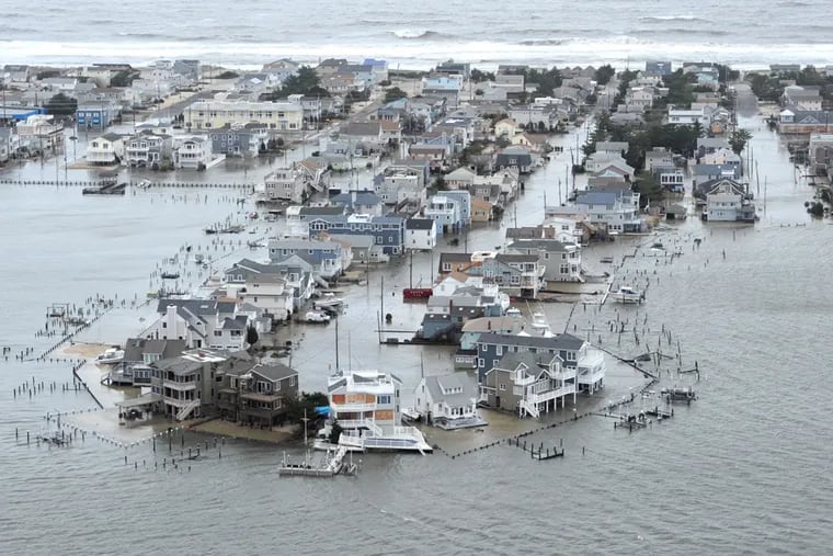 Portion of West 27th Street in Ship Bottom, N.J., on Long Beach Island is underwater Tuesday, Oct. 30, 2012, a day after Hurricane Sandy blew across the New Jersey barrier islands. ( CLEM MURRAY / Staff Photographer )