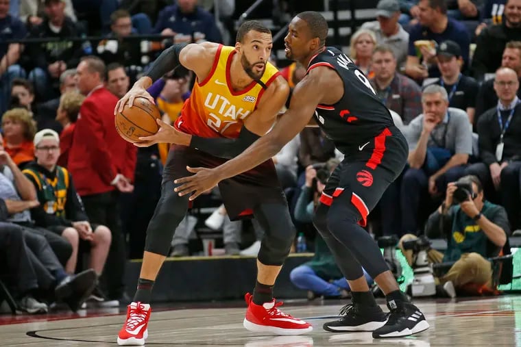 Utah Jazz center Rudy Gobert (27) on Monday against Serge Ibaka and the Toronto Raptors. Gobert tested positive for coronavirus Wednesday in Oklahoma City, forcing his team, the Thunder, and the Raptors into quarantines.