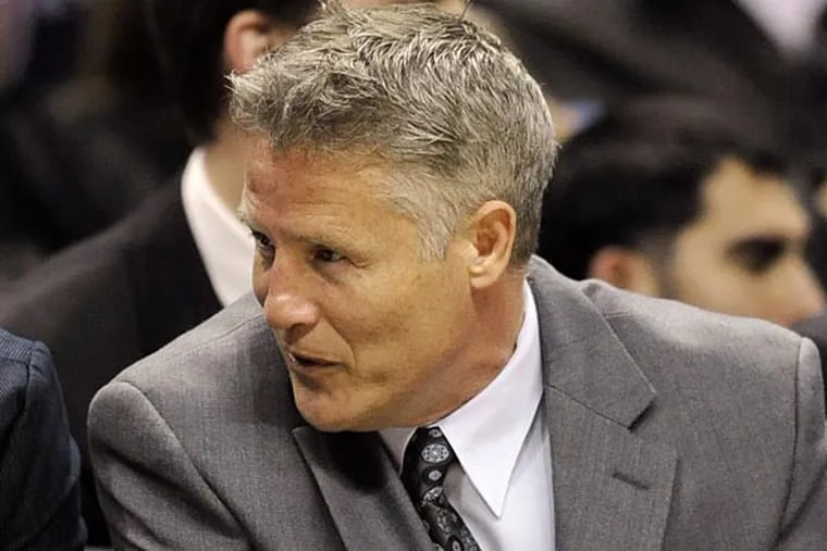 Spurs assistant Brett Brown is said to be the leading candidate to fill the Sixers' head coaching vacancy. Bahram Mark Sobhani / AP