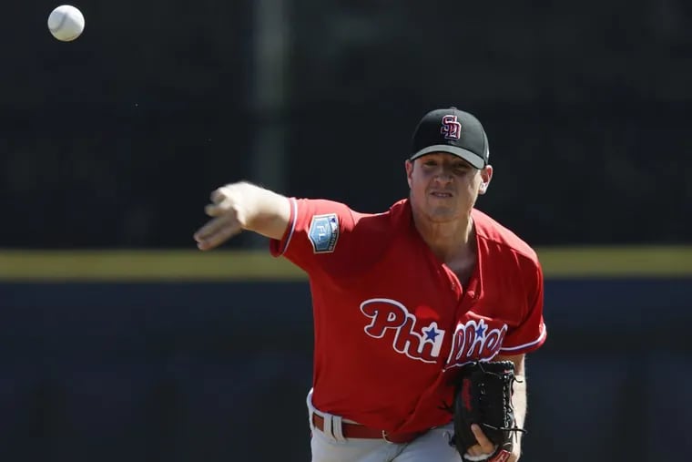 Phillies pitcher Nick Pivetta throws a first-inning warm-up pitch against the Toronto Blue Jays during a spring training game at Dunedin Stadium in Dunedin, FL on Friday.