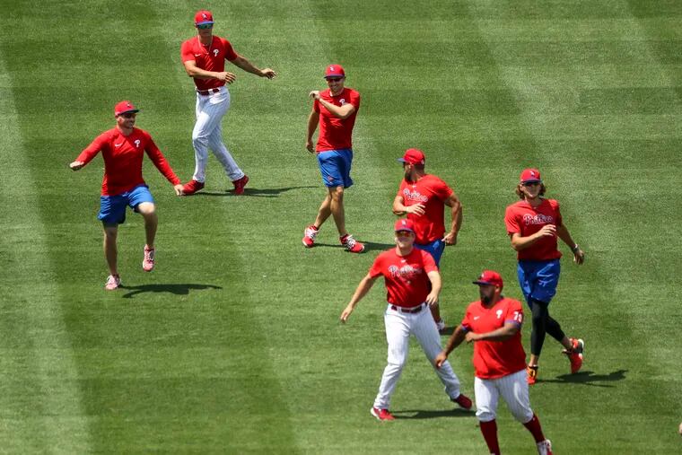 Philadelphia Phillies players warm up before a workout at Citizens Bank Park in Philadelphia, Pa. on Sunday, July 12, 2020.