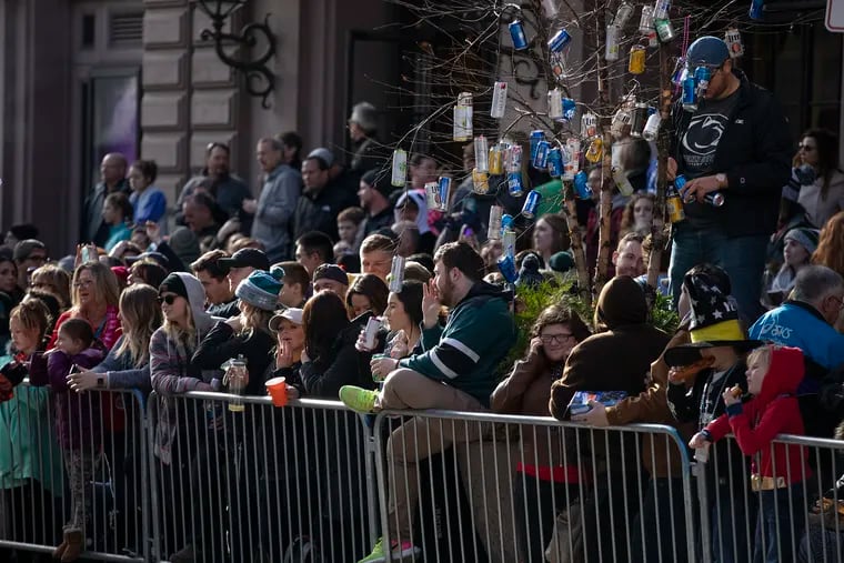 A crowd lined up along Broad Street to watch the Mummer Parade on Tuesday, Jan. 01, 2019. The unseasonably warm weather drew large crowds.