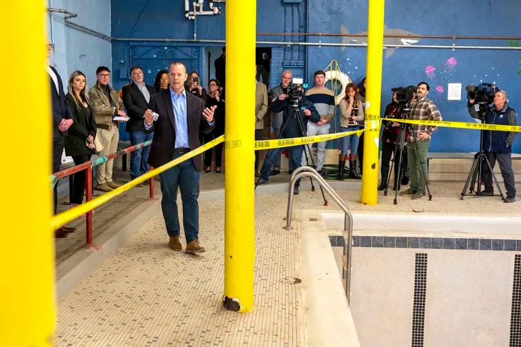 Haynes Hendrickson, vice president of the board of Moorestown Community House, gives a tour of the no longer used pool area where a microbrewery and space for brewing classes are planned.