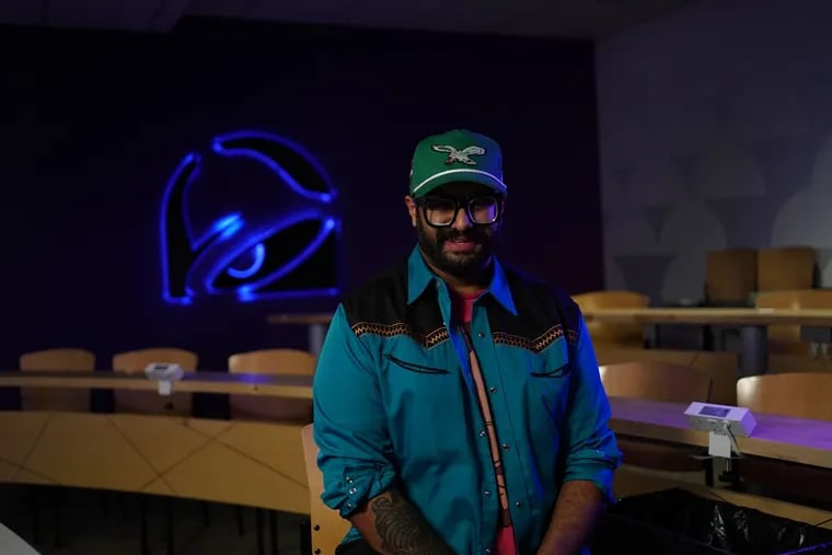 Philadelphia-based chef Reuben Asaram poses in Taco Bell's corporate headquarters in California. The fast-food chain tapped Asaram to create a limited edition Crunchwrap Supreme, which Asaram says will include Indian influences.