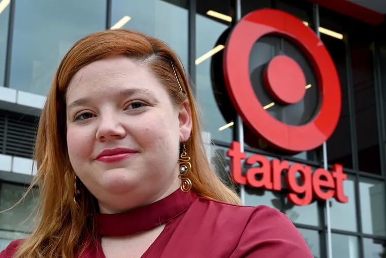 Carolyn King poses outside the Target on South Broad Street on Aug. 31. She filed a complaint against Target in 2020, and the City of Philadelphia's Department of Labor issued a $22,000 fine to Target, its biggest Fair Workweek fine to date, for violating the city's year-old Fair Workweek law. The law mandates consistent schedules for low-wage retail and fast-food workers.