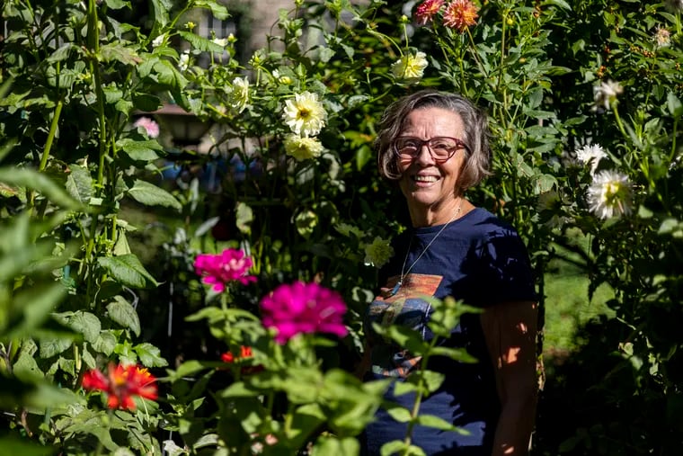 Jean Wilcox, of West Mount Airy, Pa., Retired Marketing Professor and Business owner of Vegartable, poses for a portrait in her garden in Philadelphia, Pa., on Thursday, Sept., 14, 2023.