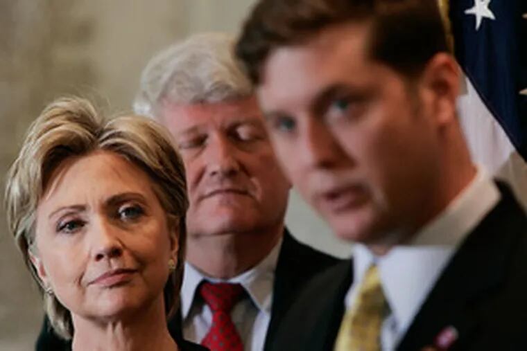 Rep. Patrick J. Murphy (right) and Sen. Hillary Rodham Clinton introduced a bill yesterday that would boost benefits to Iraq-era veterans. It is the second time the Bucks freshman and a top presidential candidate have joined legislative forces. And it is not surprising, an observer says. Story on A3.