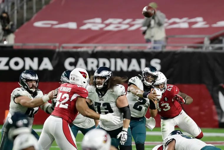 Eagles quarterback Jalen Hurts passes against the Arizona Cardinals.