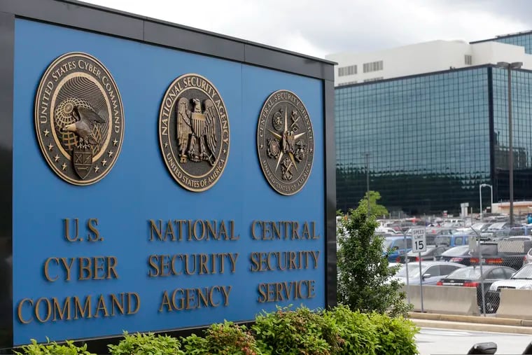 The sign outside the National Security Administration (NSA) campus in Fort Meade, Md., June 6, 2013. Companies critical to U.S. national interests will have to report when they’re hacked or they pay ransomware. The new rules approved by Congress are part of a broader effort by the Biden administration and Congress to shore up the nation’s cyberdefenses after a series of high-profile digital espionage campaigns and disruptive ransomware attacks.