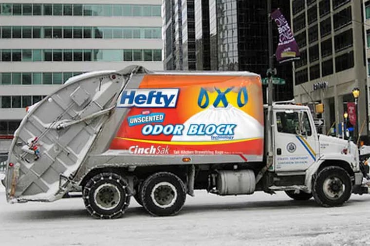 Caption: A photo illustration depicts hypothetical advertising on a garbage truck. (Credit: Philadelphia City Council)