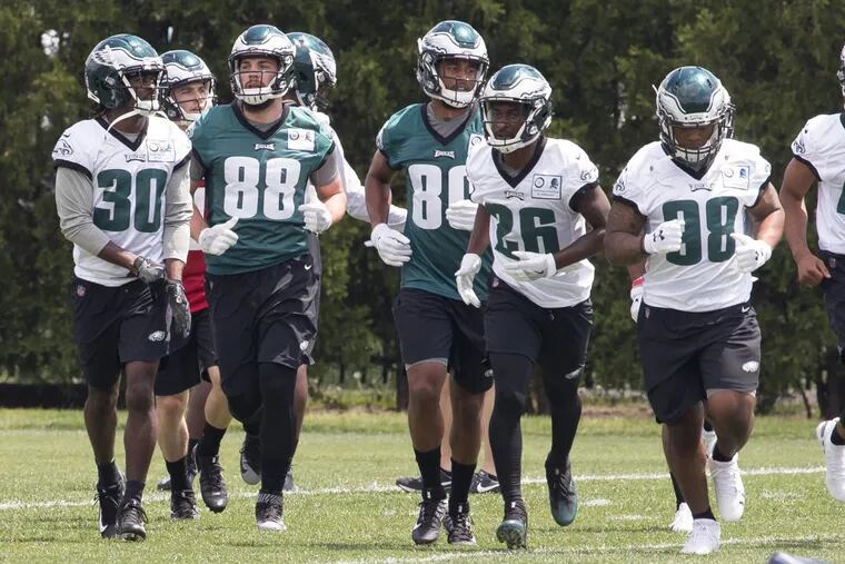 Dallas Goedert (second from left) and his fellow Eagles rookies during their mini camp on Friday at the Novacare Complex.