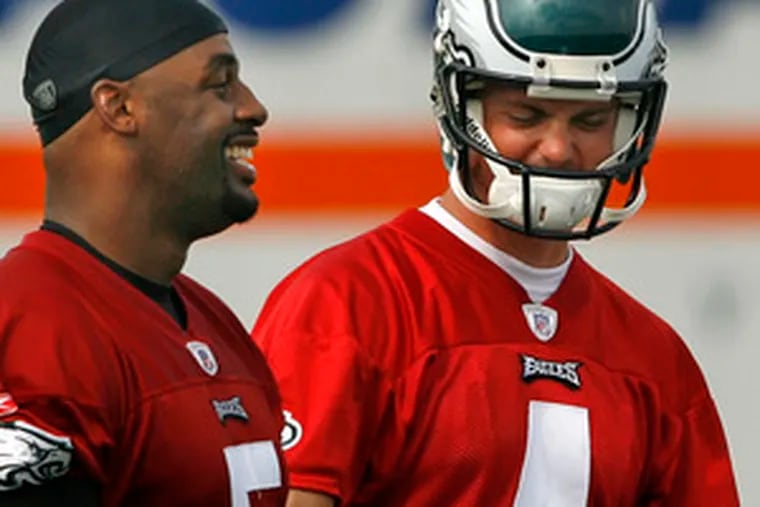 Rookie quarterback Kevin Kolb (4) shares a light moment with Donovan McNabb at training camp at Lehigh. &quot;He is a jokester. He&#0039;s a funny guy,&quot; Kolb said of McNabb.