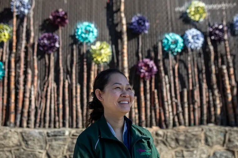 Ngoc Lam-Mathis outside of her shop, Floraltology, in Southwest Philadelphia. “This is really what I want to do all my life,” she said. “It’s a big commitment and it brings me peace.”