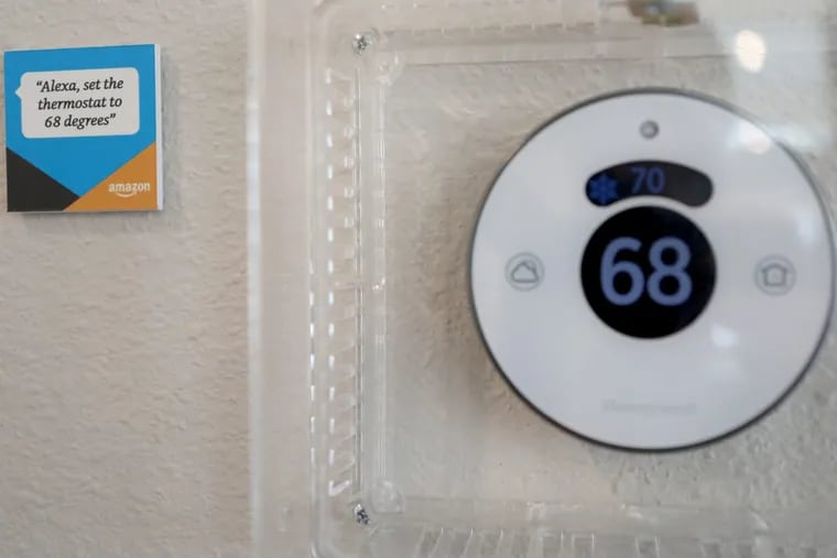 A display shows how Amazon’s Alexa can be used to set the thermostat in a model home in Vallejo, Calif. Homebuilder Lennar has teamed up with Amazon to offer homes with Alexa technology included.