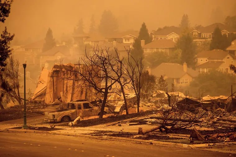 Homes leveled by the Glass Fire line a street in the Skyhawk neighborhood of Santa Rosa, Calif. in September. On Friday, President Donald Trump’s administration approved a previously rejected California application for disaster relief funds to clean up damage from six recent wildfires.