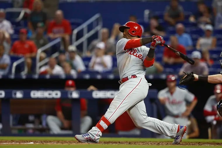 Jean Segura's first home run as a Phillie came in the top of the 14th at Marlins Park on Sunday.