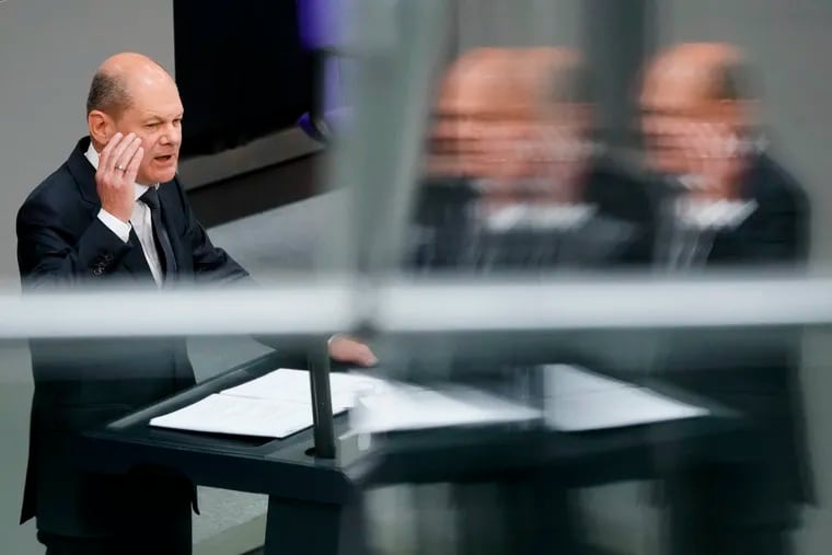 German Chancellor Olaf Scholz delivers a speech during a session of the German parliament Bundestag at the Reichstag building in Berlin, Germany, on Wednesday.