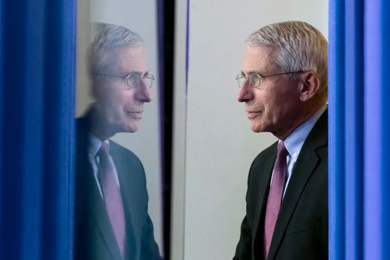 Anthony Fauci arrives to speak about the coronavirus at the White House on April 22, 2020. While COVID-19 may no longer be a global threat, an increasingly authoritarian government still is, writes Jennifer Stefano.