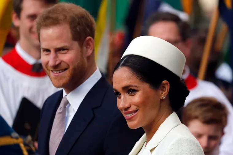 FILE - In this Monday, March 11, 2019 file photo, Britain's Prince Harry and Meghan, the Duchess of Sussex leave after the Commonwealth Service at Westminster Abbey in London. Prince Harry and Meghan Markle are to no longer use their HRH titles and will repay £2.4 million of taxpayer's money spent on renovating their Berkshire home, Buckingham Palace announced Saturday, Jan. 18. 2020.
