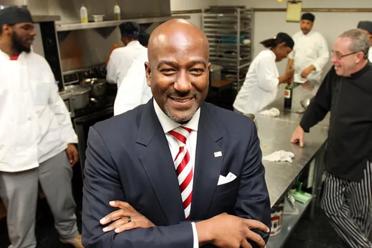 Dr. Kevin Johnson is the new president and CEO of OIC in Philadelphia. He poses as he visits classes in the Hospitality Job Training program on Jan. 14, 2015. ( DAVID MAIALETTI / Staff Photographer )