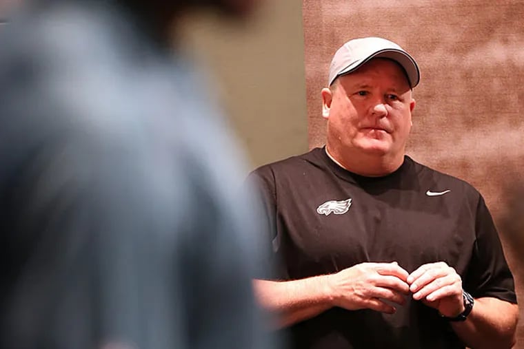 Nelson Agholor (left) speaks during a news conference with the Eagles
2015 first-round pick as coach Chip Kelly listens. (David Maialetti/Staff Photographer)