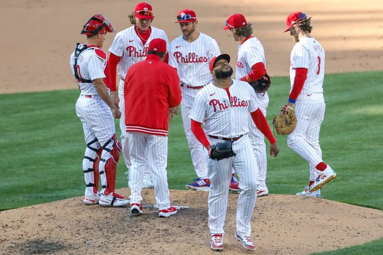 Phillies relief pitcher Jose Alvarado reacts after being pulled from the game in the eighth inning. He faced seven batters and retired only two.