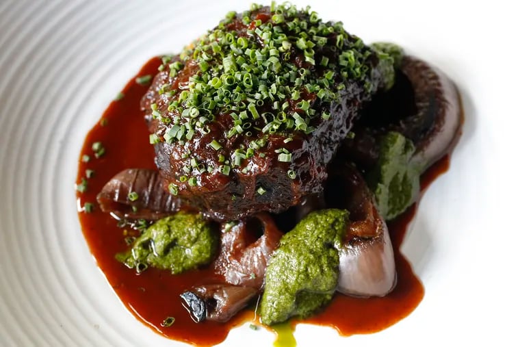 Braised beef cheeks with celery root, charred onion and salsa verde served at Osteria on North Broad Street.