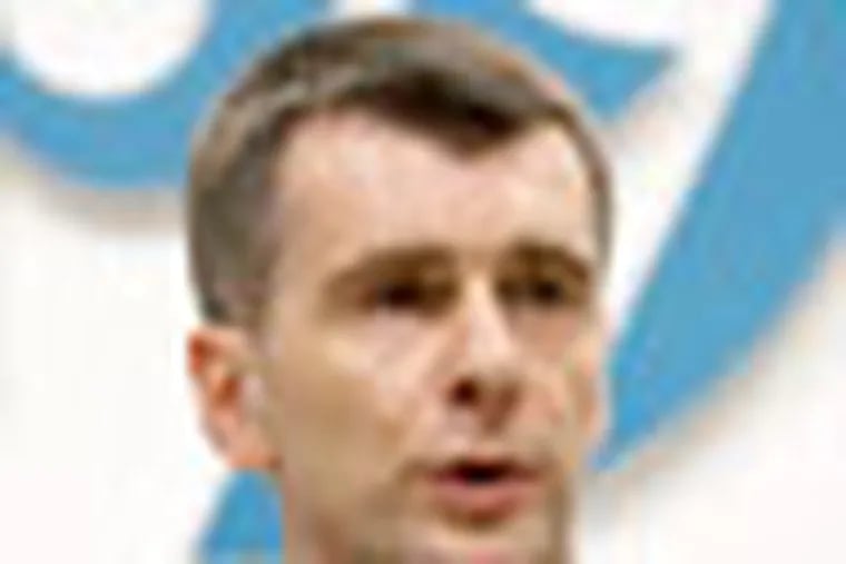 Mikhail Prokhorov, one of Russia's richest tycoons and New Jersey Nets basketball team owner, speaks at a press conference in Moscow, Russia, Monday, Dec. 12, 2011, as he announces his candidacy to run against Russian Prime Minister Vladimir Putin in the March 2012 presidential election.   Prolhorov has been cautious not to cross Putin's path in the past, but may pose a serious challenge to Putin, whose authority has been dented by the Dec. 4 parliamentary election and recent massive street protests against alleged vote fraud. (AP Photo/Misha Japaridze)