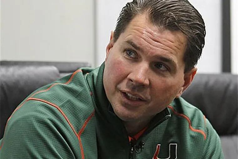 Al Golden says he intends to stay on at Miami and work to rebuild the program. (Alan Diaz/AP)