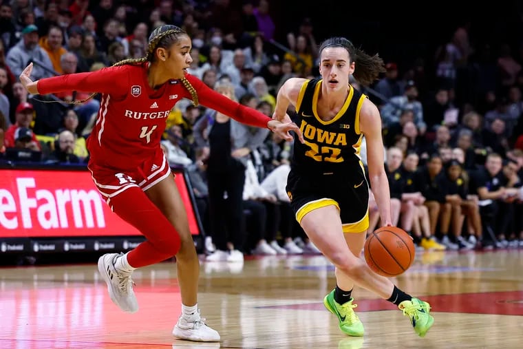 Iowa basketball star Caitlin Clark (right) posted a triple-double with 29 points, 10 rebounds, and 10 assists on Friday night.