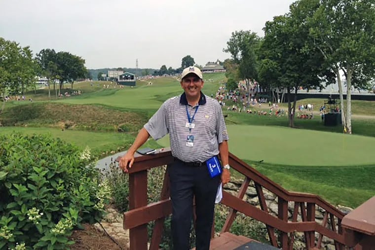 Tom Carpus at 2014 PGA at Valhalla, standing in front of 13th green.