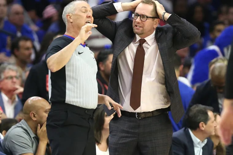 Nick Nurse, then-coach of the Raptors, questions the call of an official during their NBA playoff game at the Wells Fargo Center on May 2, 2019.
