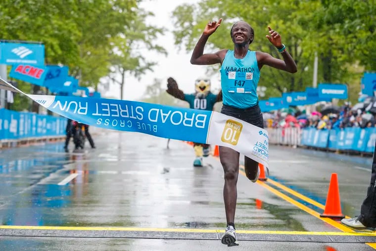 Susan Jerotich crosses the finsh line as female winner of the Broad Street Run in an unofficial time of 54:42 on May 5, 2019.