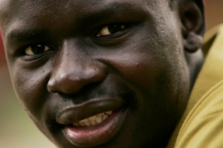 Peter Ajak, a child refugee from the Sudan, has grown up - and worked hard and succeeded - in Phila.