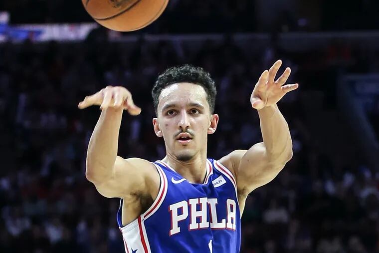 Sixers rookie Landry Shamet throws a pass against the Wizards. He came up big in JJ Redick's absence.